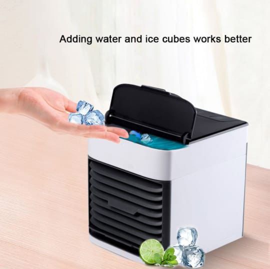 Arctic Air Cooler is a portable mini air cooler with water-based cooling system. Stay cool anywhere with this energy-efficient device at Rs. 2499.